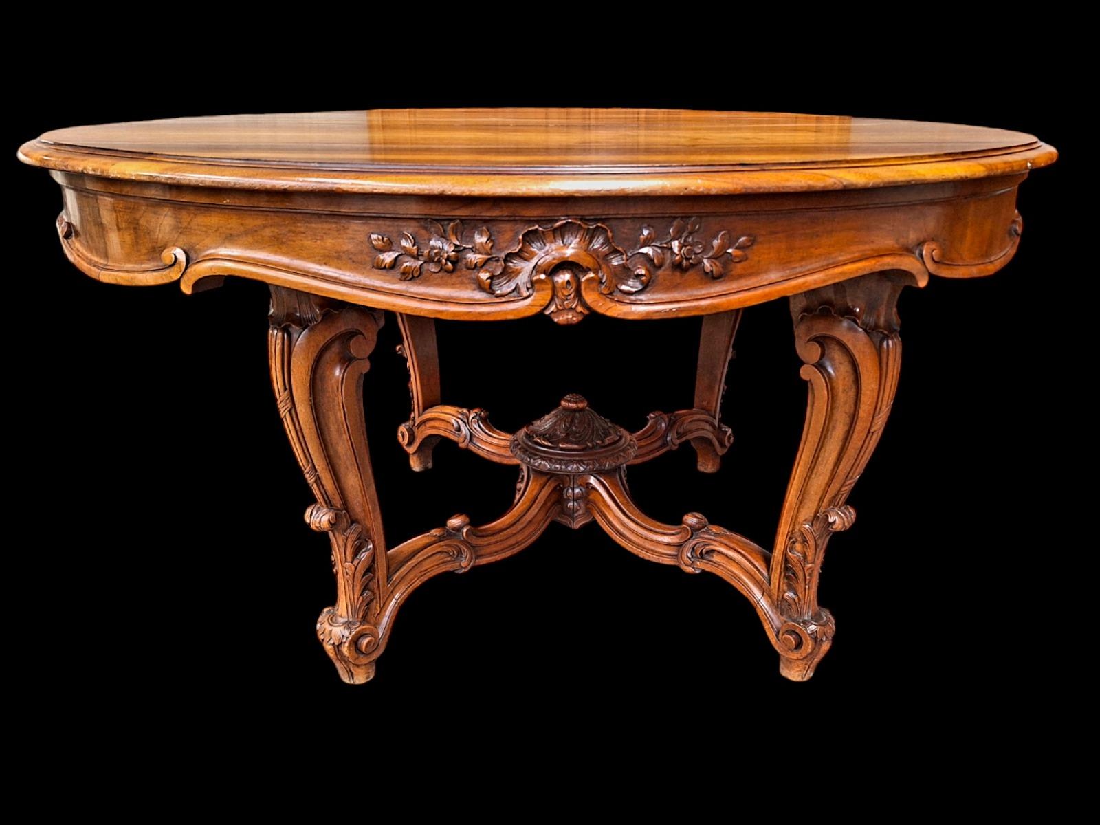 9-piece walnut dining suite in Louis XV style.