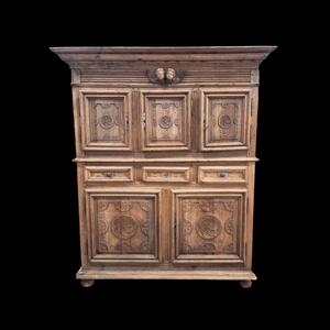 A 17th century massive oak cupboard.