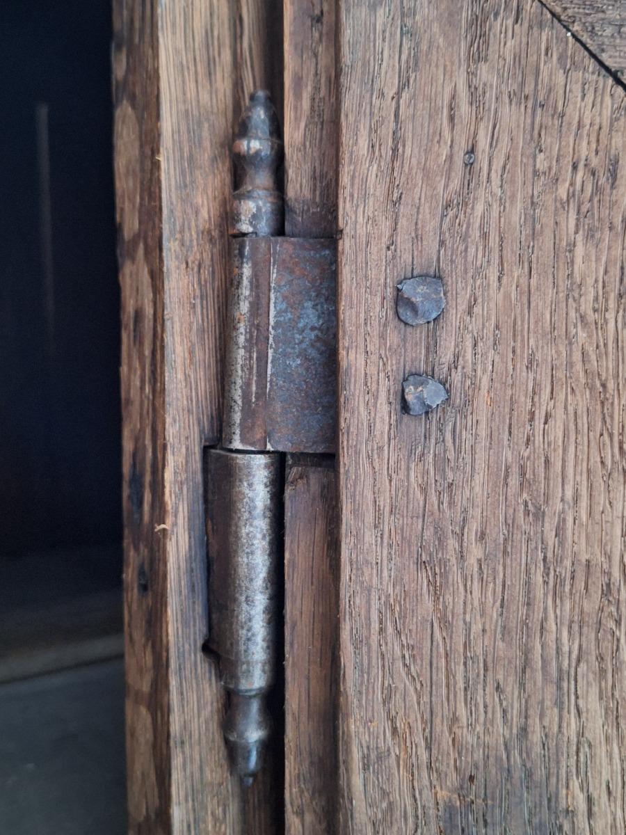 A 17th century massive oak cupboard.