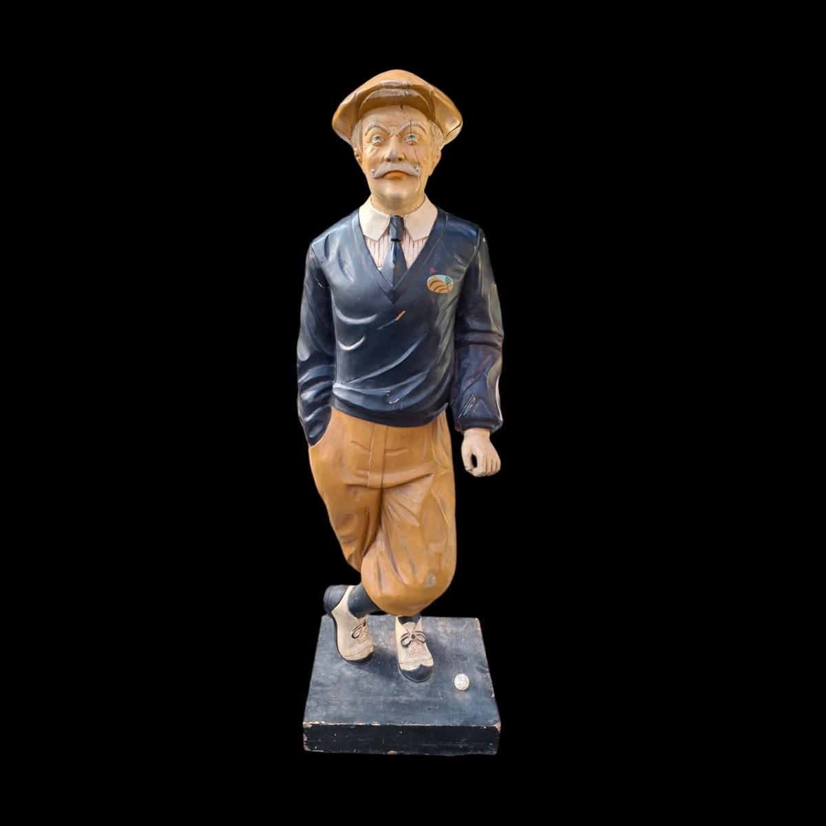 A decorative golf player