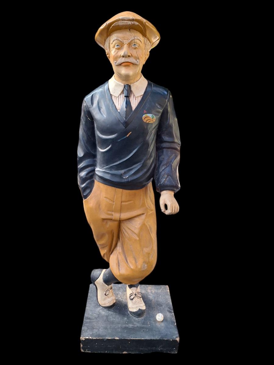 A decorative golf player