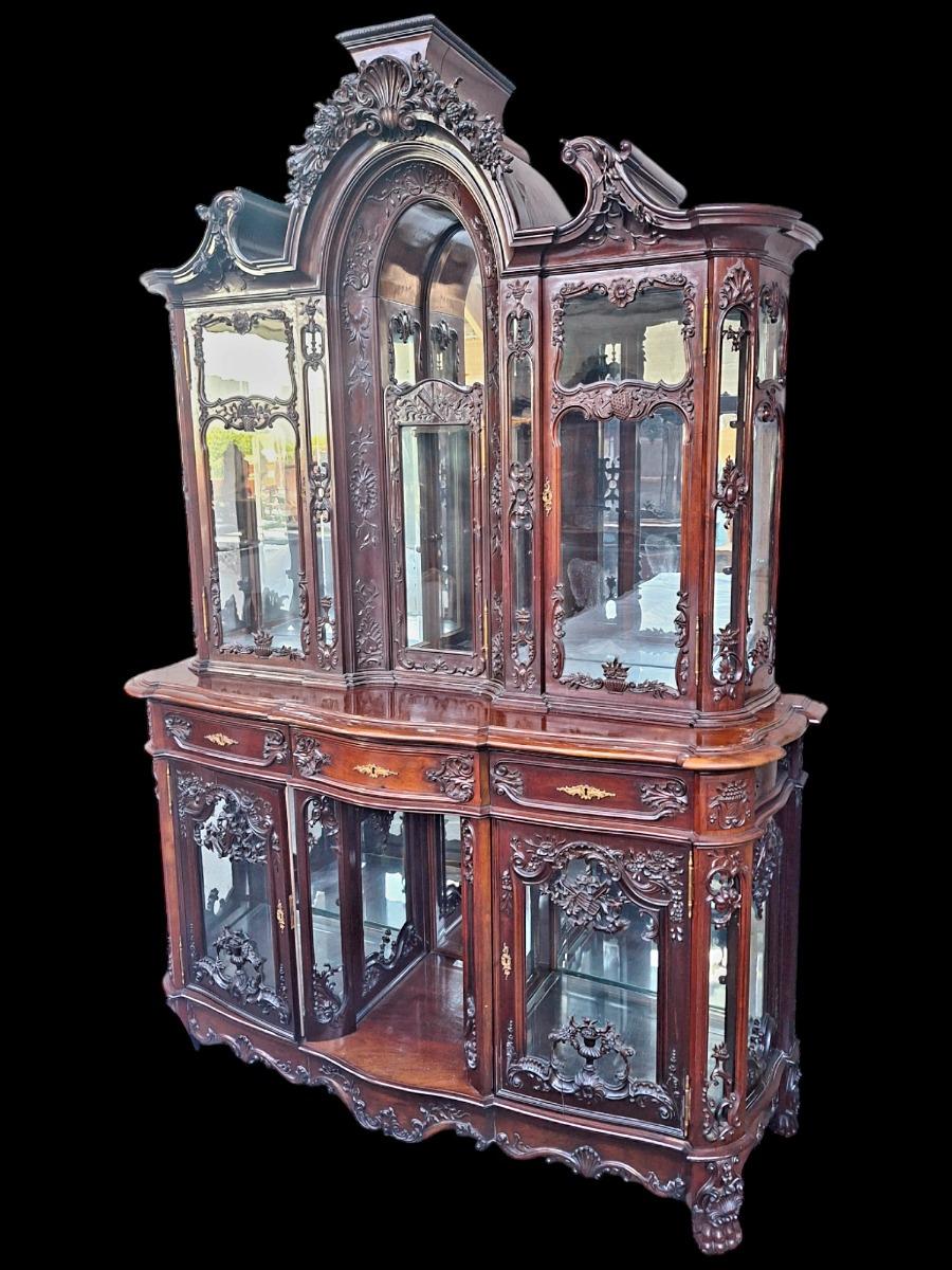 A hardwood Louis XV style display cabinet