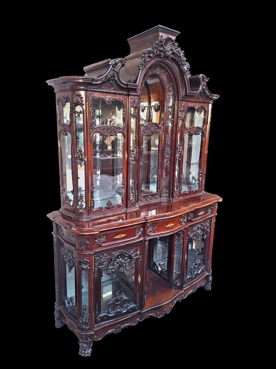 A hardwood Louis XV style display cabinet