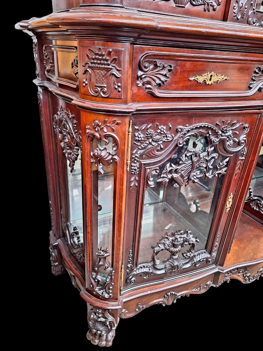 A hardwood Louis XV style display cabinet