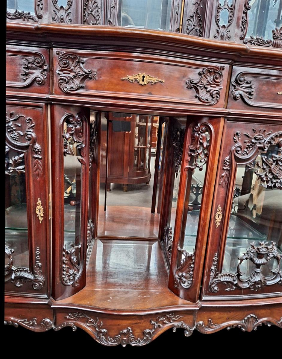 A hardwood Louis XV style display cabinet