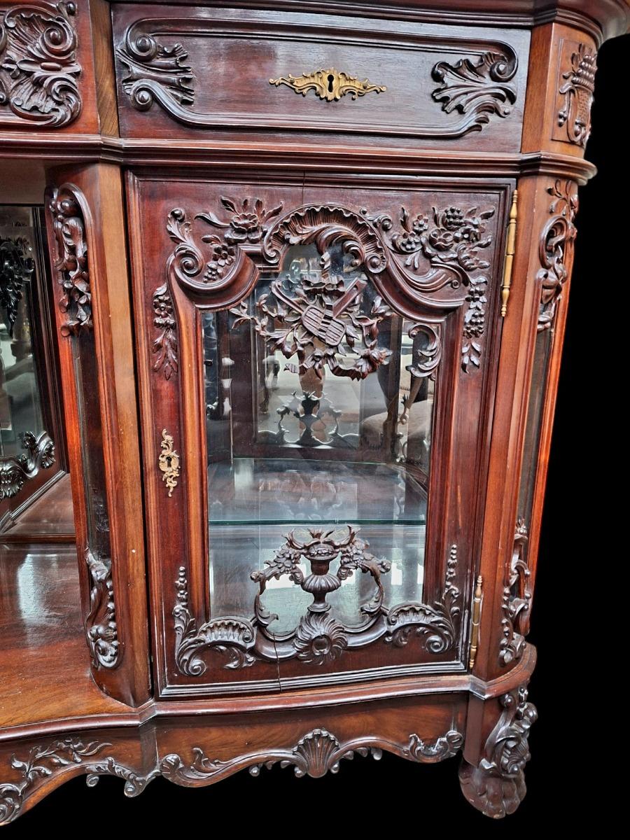 A hardwood Louis XV style display cabinet