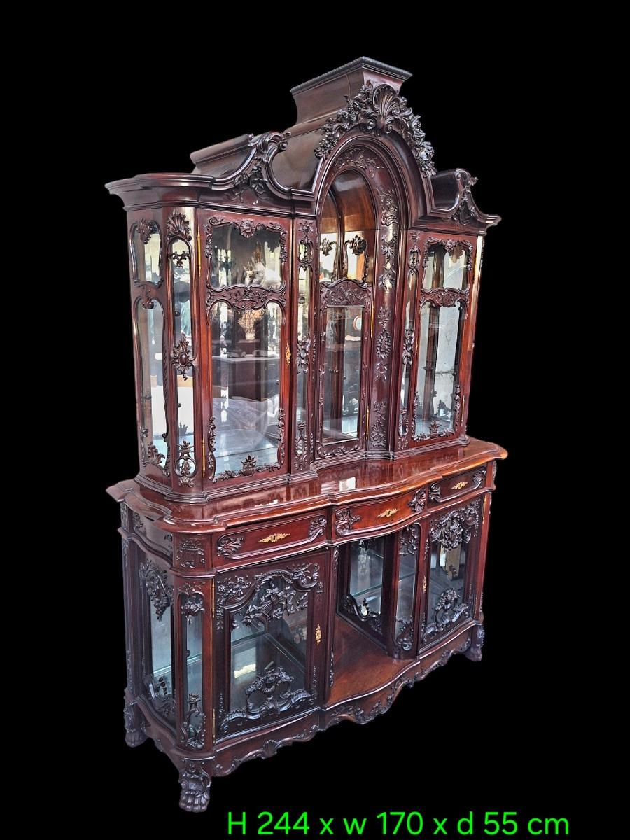 A hardwood Louis XV style display cabinet