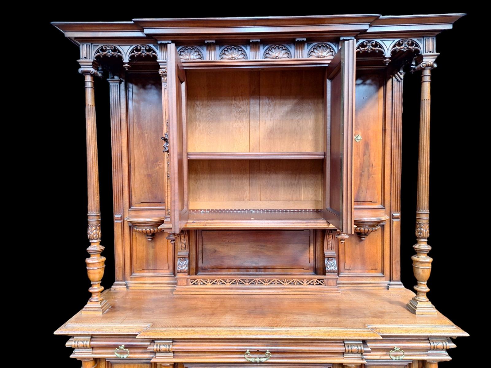 A High quality Renaissance style walnut cabinet.