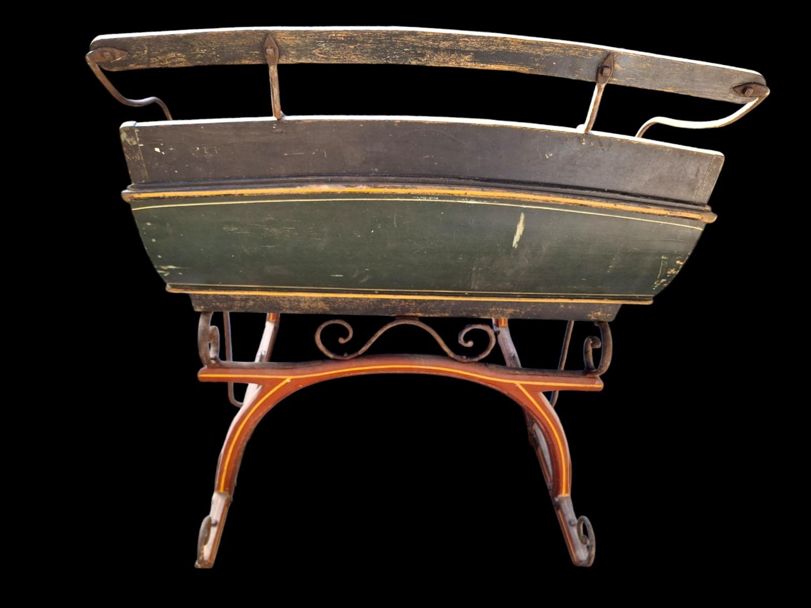 A highly decorative 19th century metal sled.