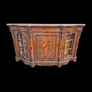 A Louis XV  style marble topped sideboard.