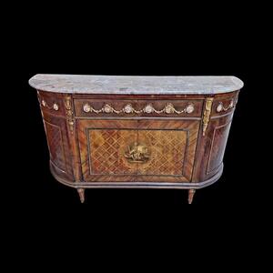 A marquetry marble topped sideboard.