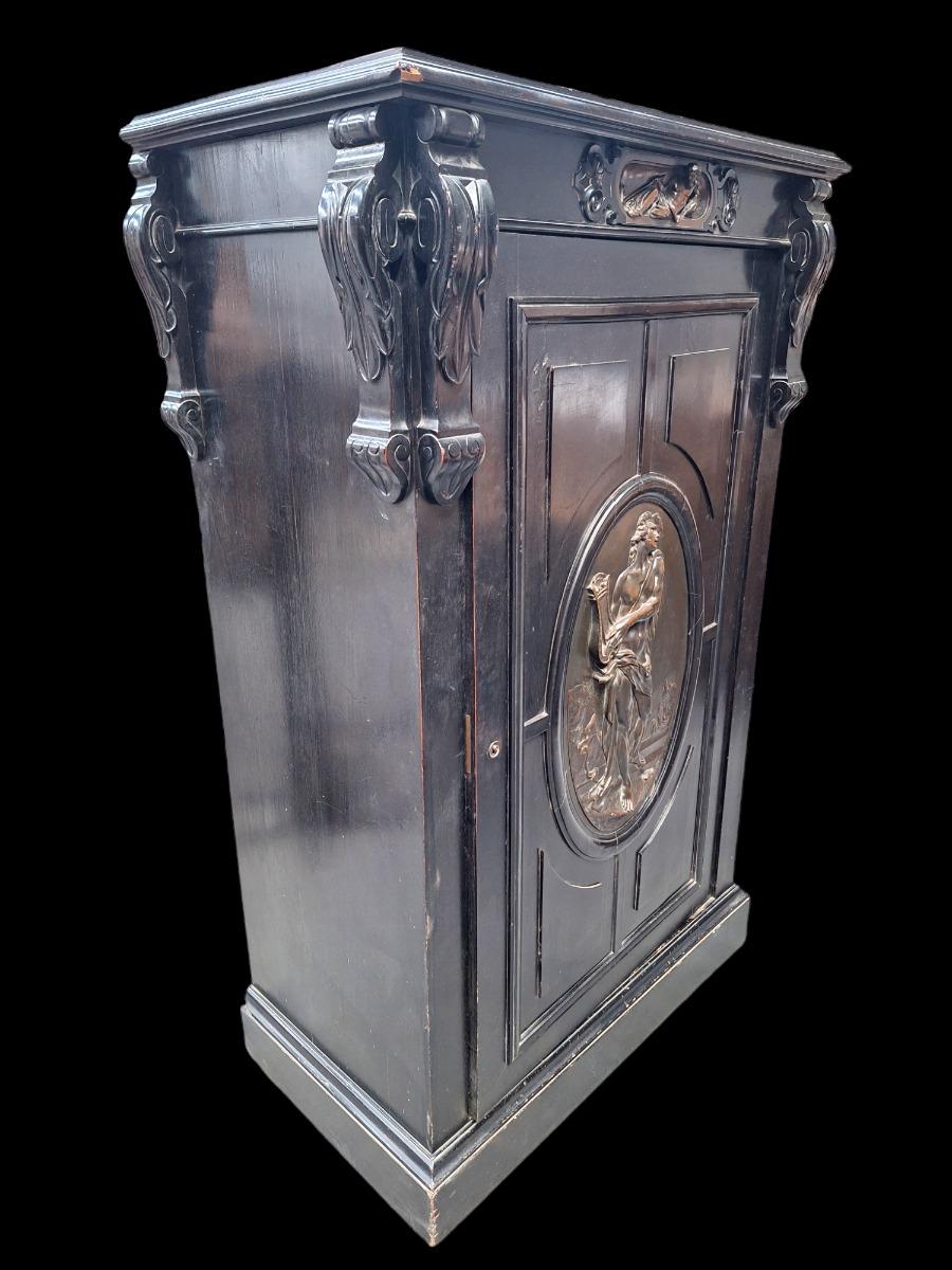 A nice ebonized hardwood cabinet Napoleon 3 style.