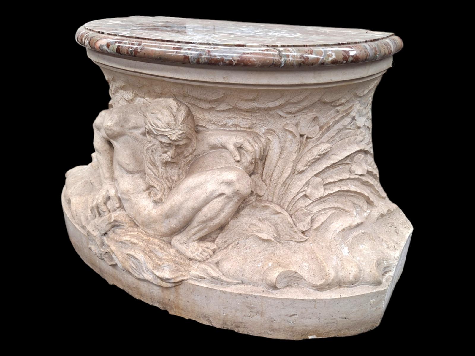 A Top quality carved stone pedestal with fine carved nautical scene