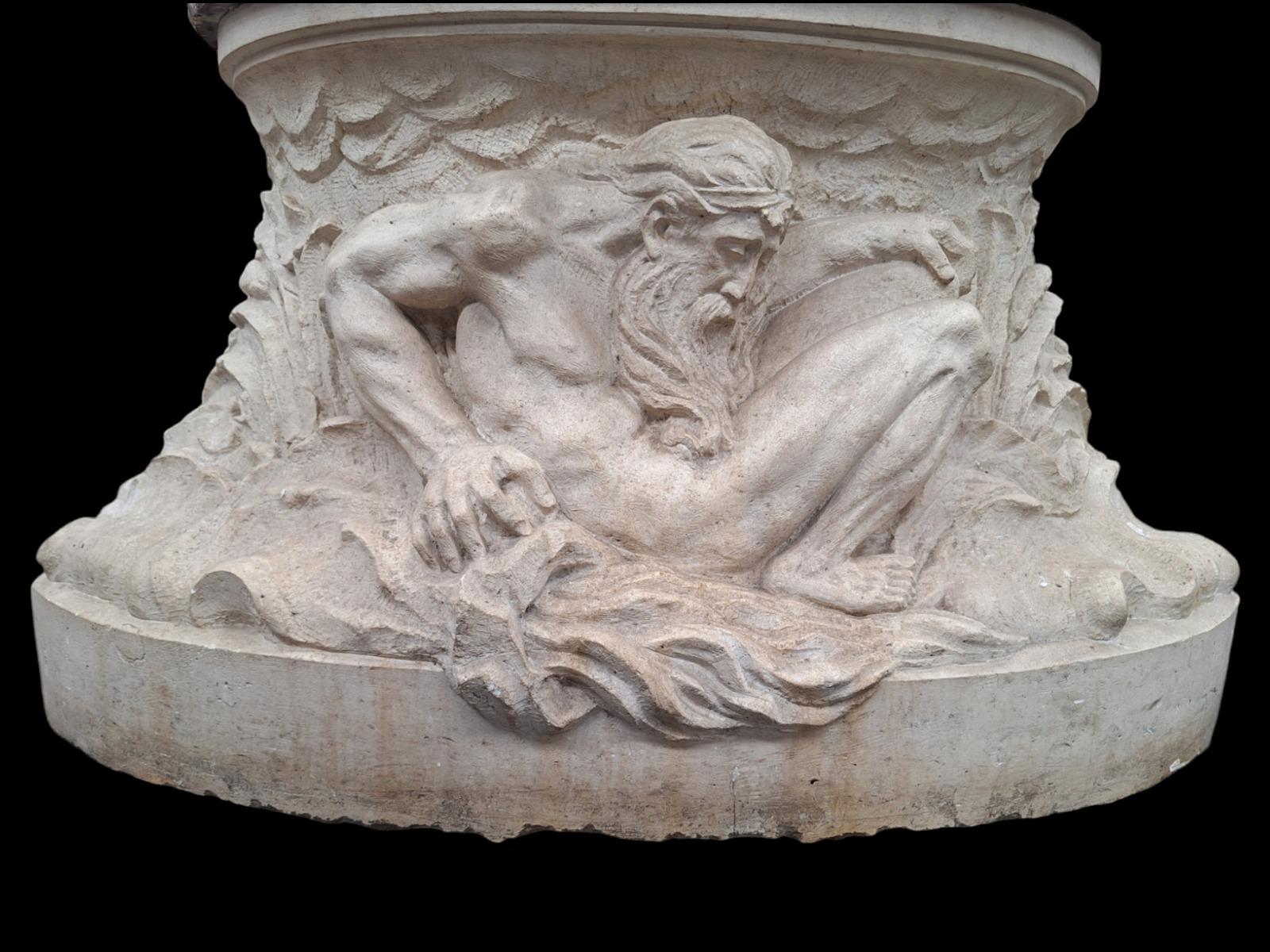 A Top quality carved stone pedestal with fine carved nautical scene