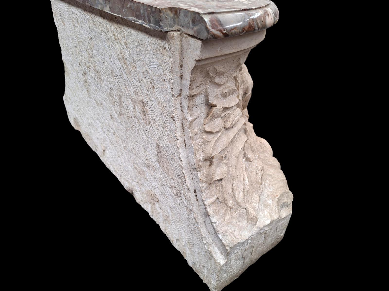 A Top quality carved stone pedestal with fine carved nautical scene