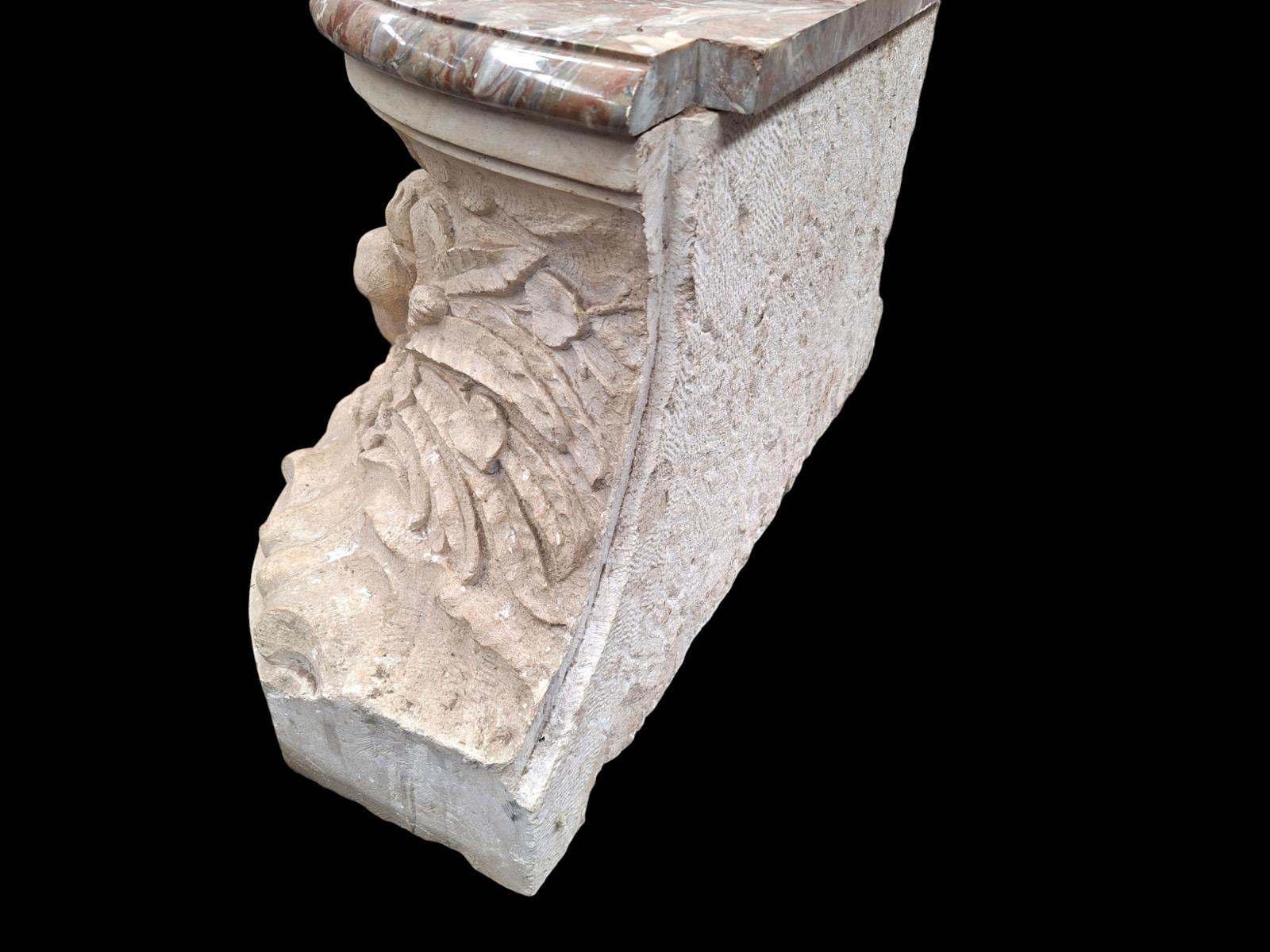 A Top quality carved stone pedestal with fine carved nautical scene