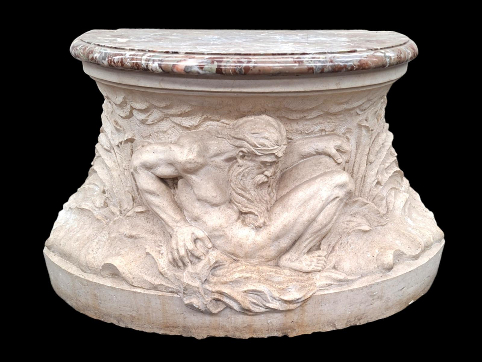 A Top quality carved stone pedestal with fine carved nautical scene