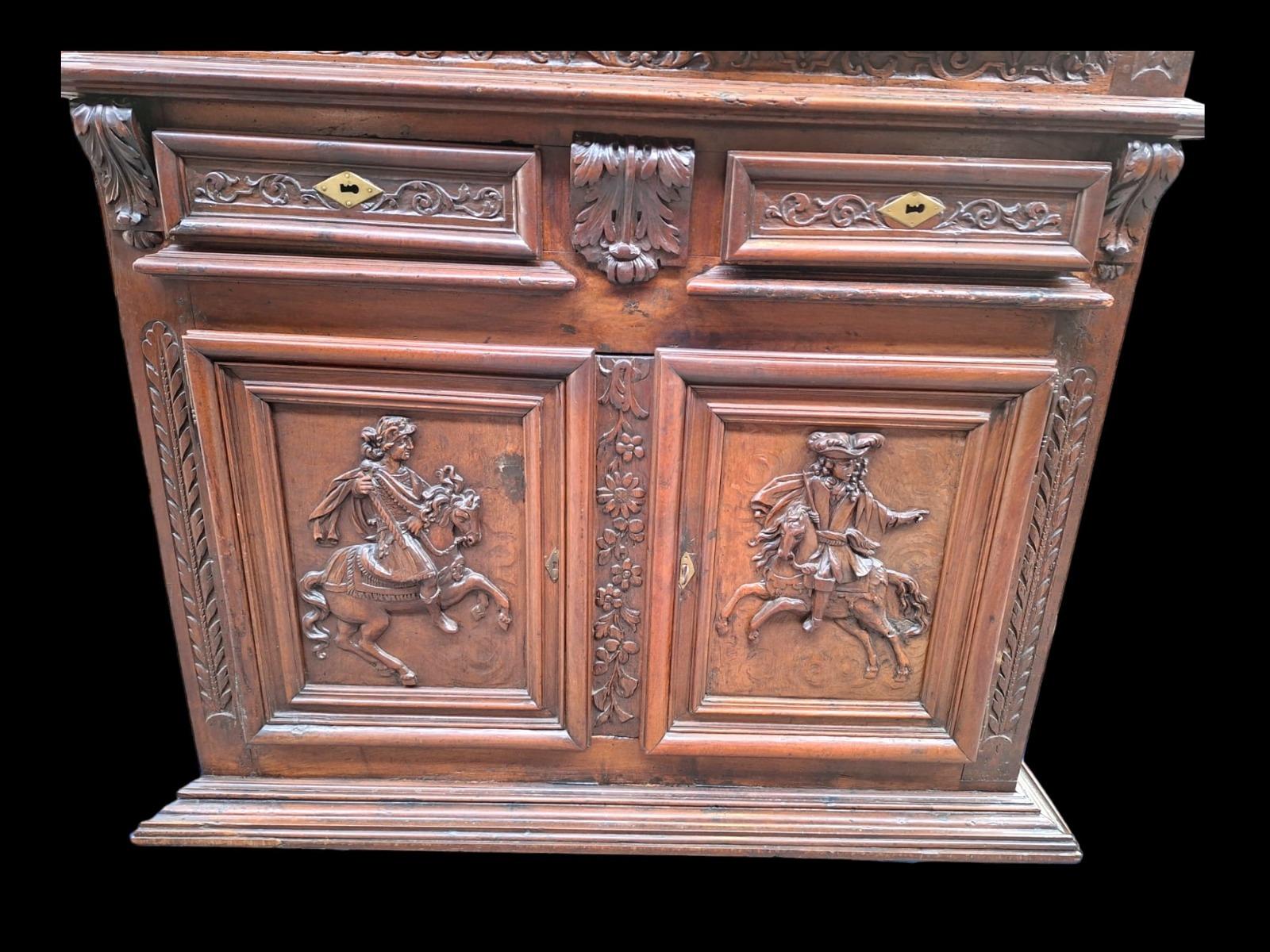 A very nice carved 4-doors walnut cabinet