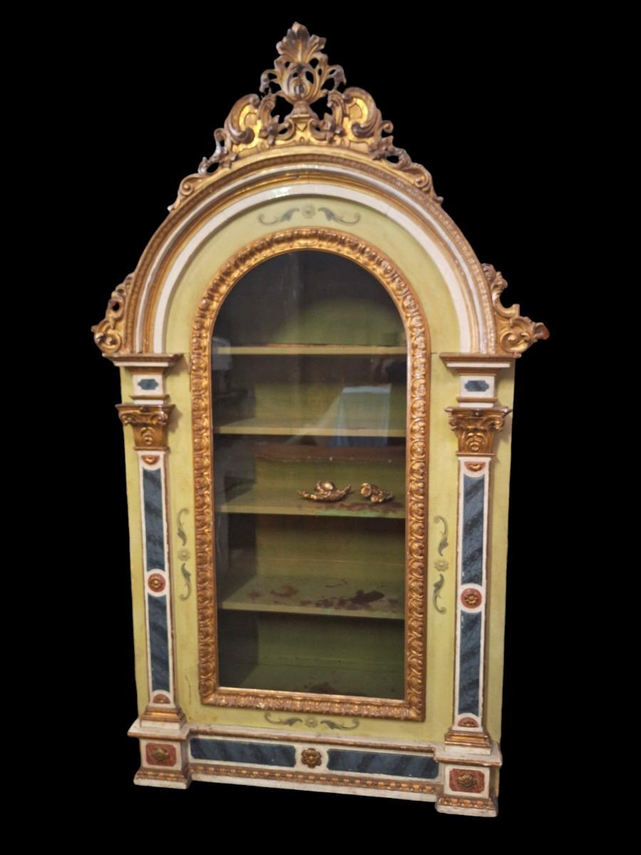 Baroque style display cabinet.