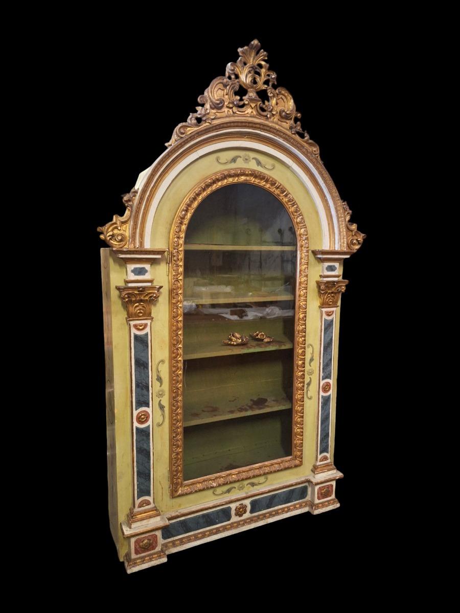 Baroque style display cabinet.