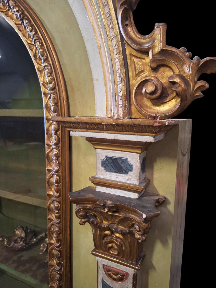 Baroque style display cabinet.