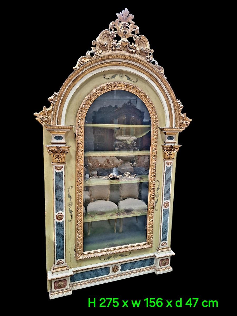 Baroque style display cabinet.