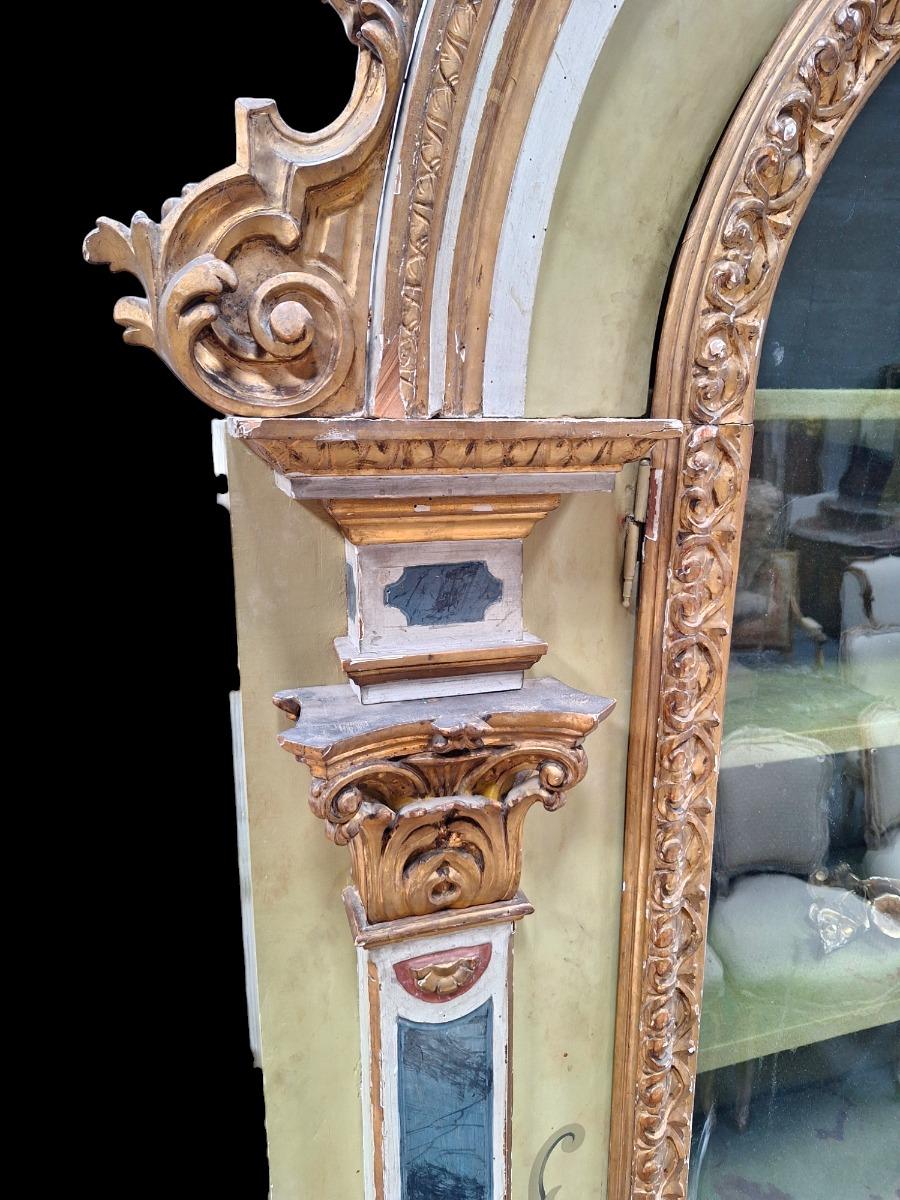 Baroque style display cabinet.