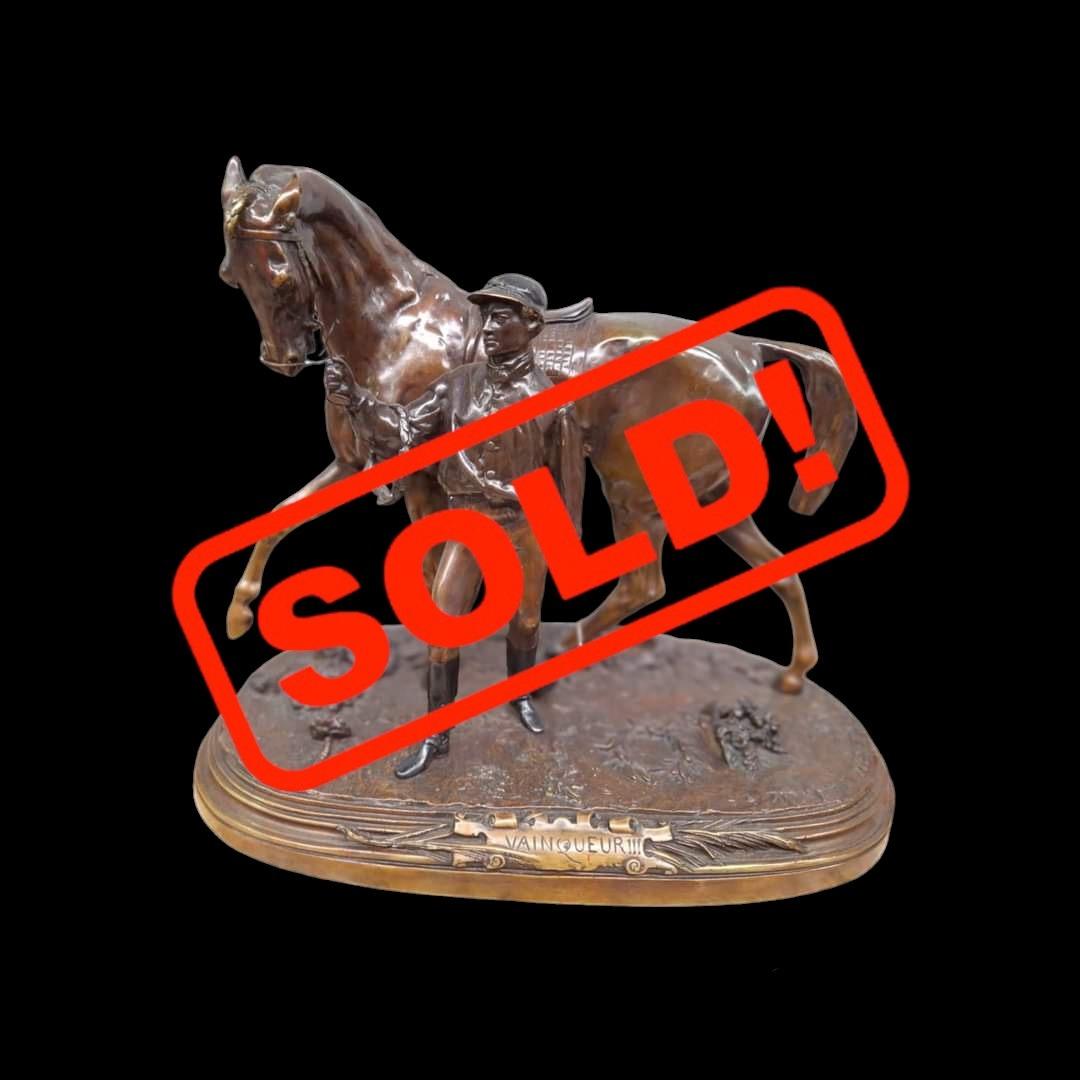 Bronze horse and jockey signed PJ Mene