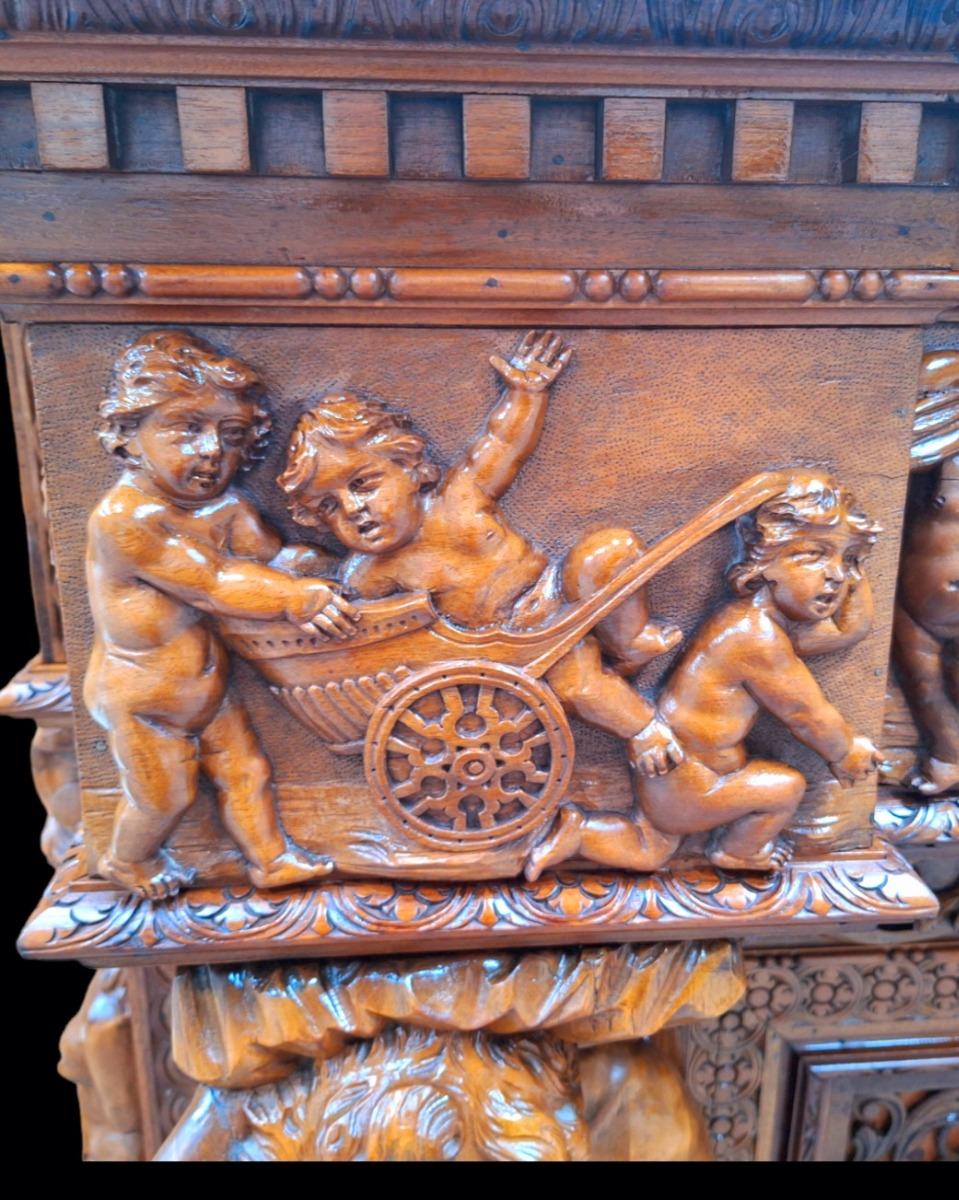 Very monumental Carved walnut firemantle in Renaissance style.