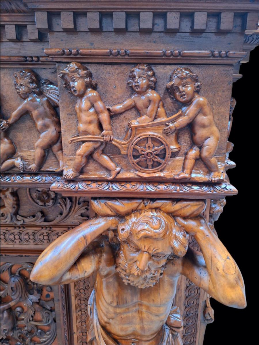 Very monumental Carved walnut firemantle in Renaissance style.