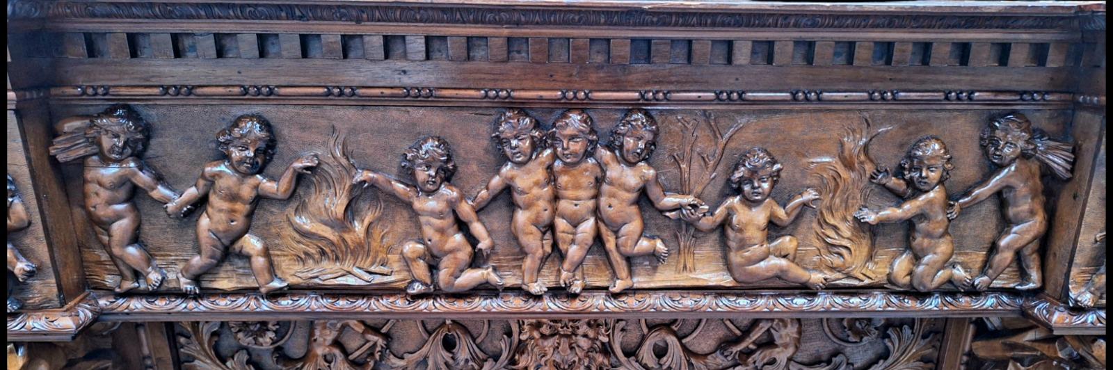 Very monumental Carved walnut firemantle in Renaissance style.