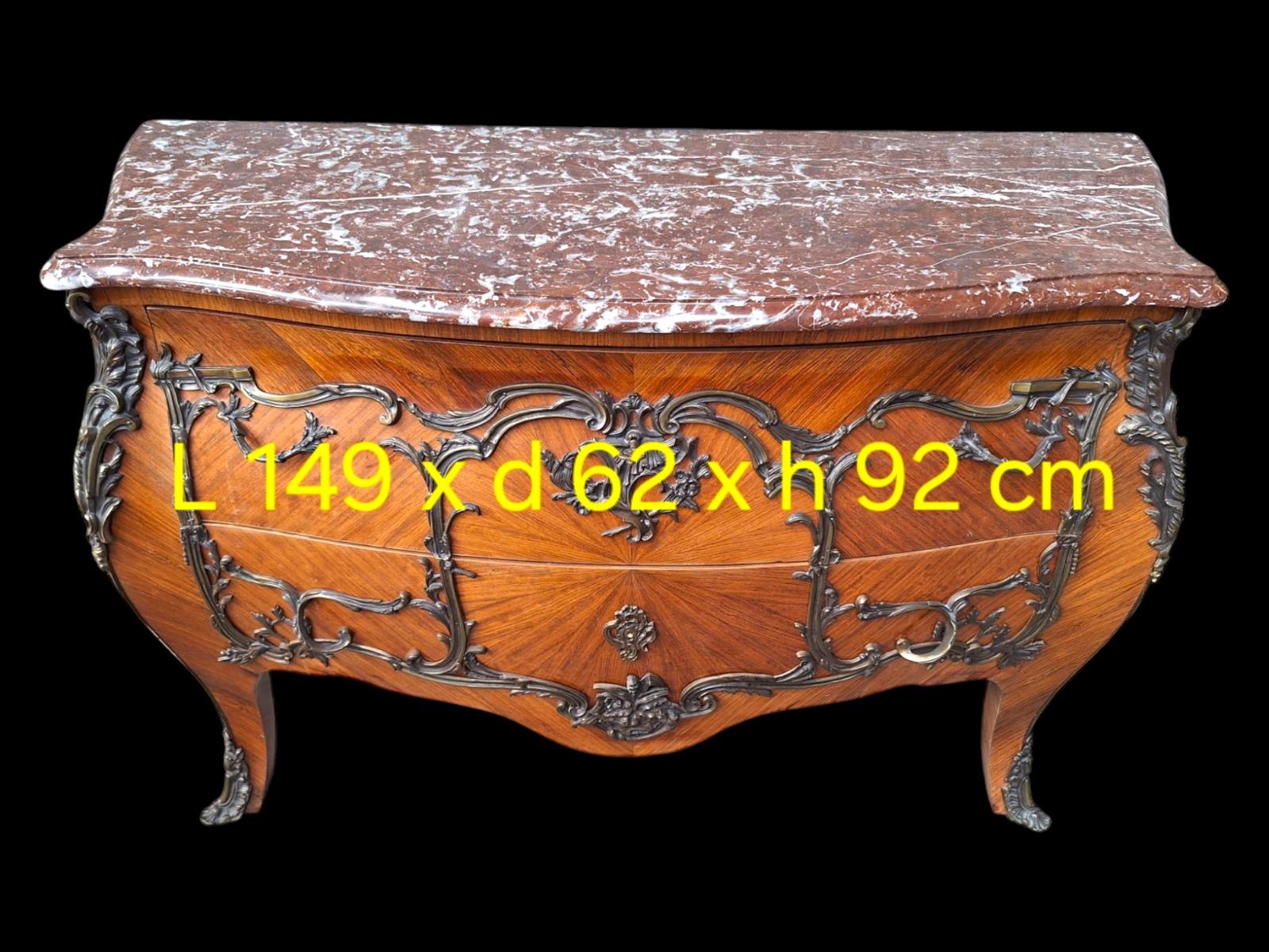 French marquetry commode with red marble top.