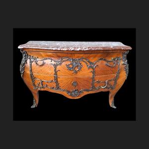 French marquetry commode with red marble top.