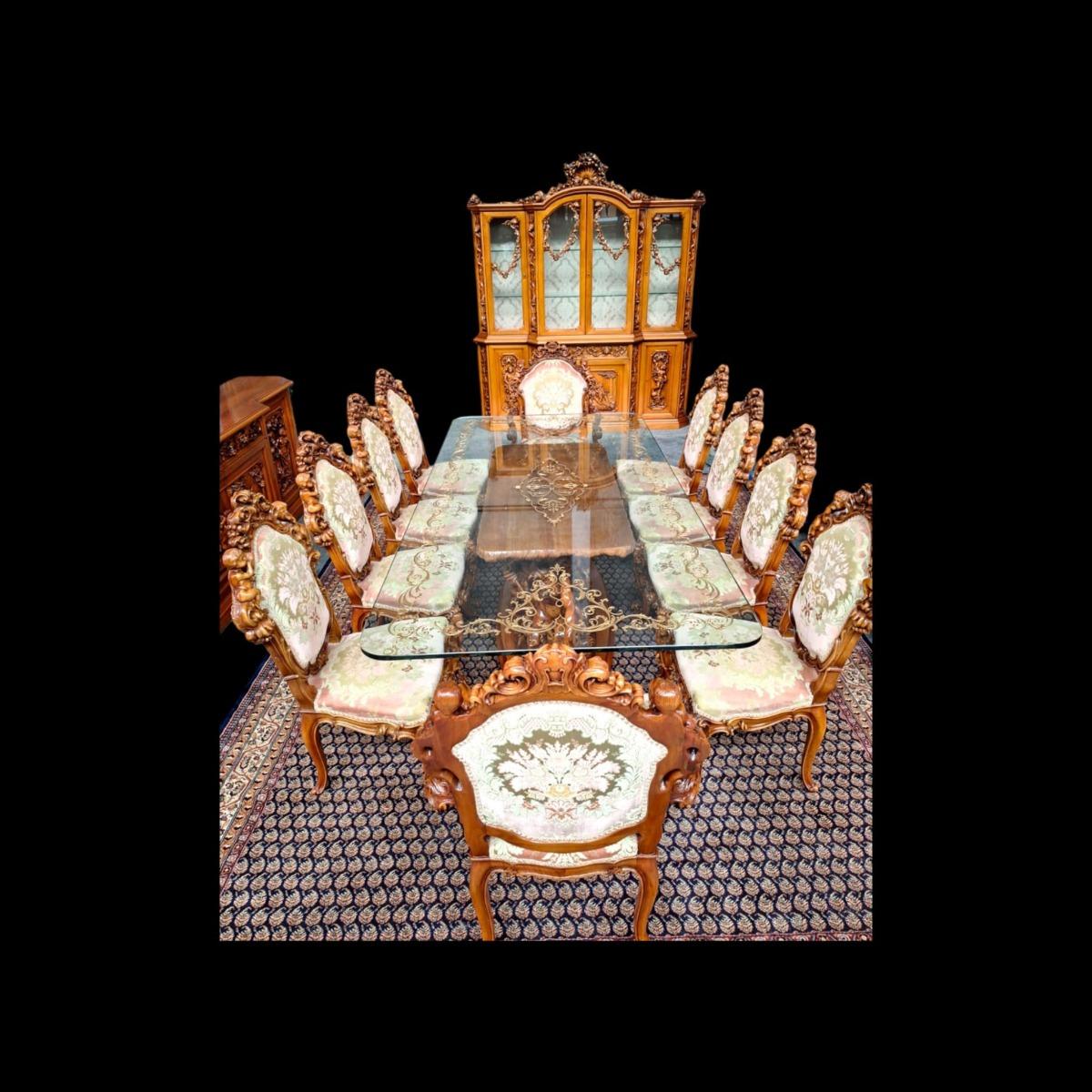 Italian Baroc style 13-piece dining suite.