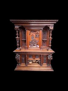 Monumental Neo-Renaissance style wallnut cabinet.