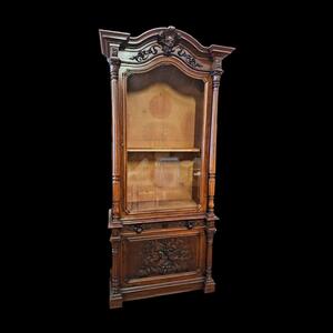 Monumental walnut display cabinet.