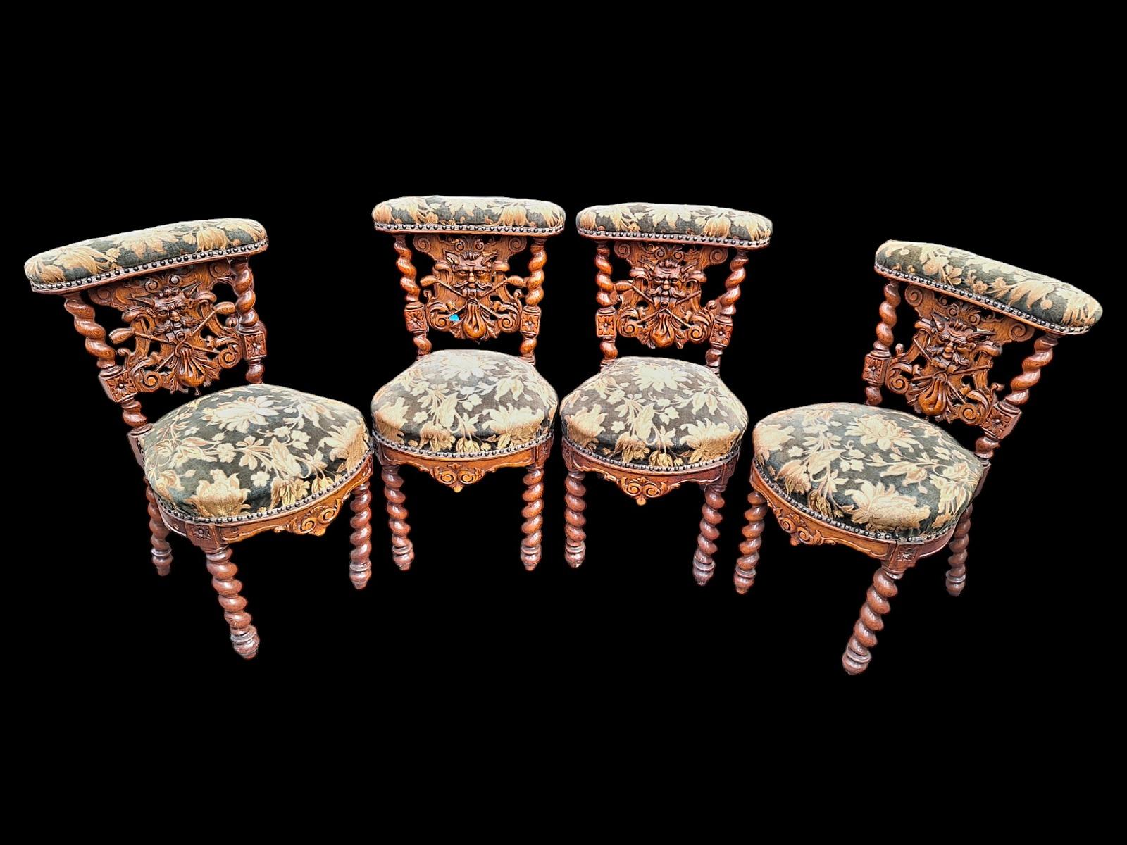 Rare Set of 4 identical smoker chairs in oak.