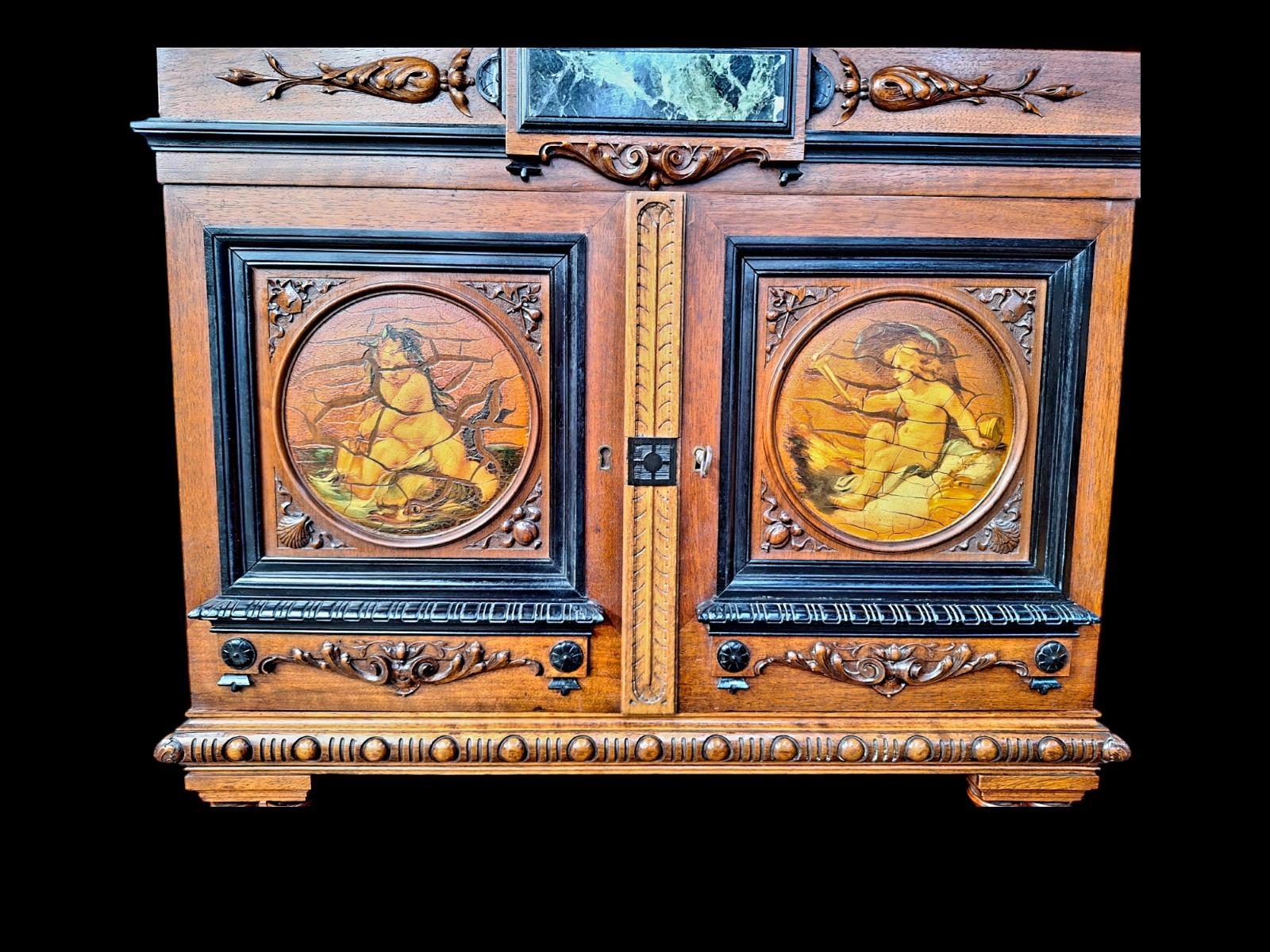 Renaissance style walnut cabinet.