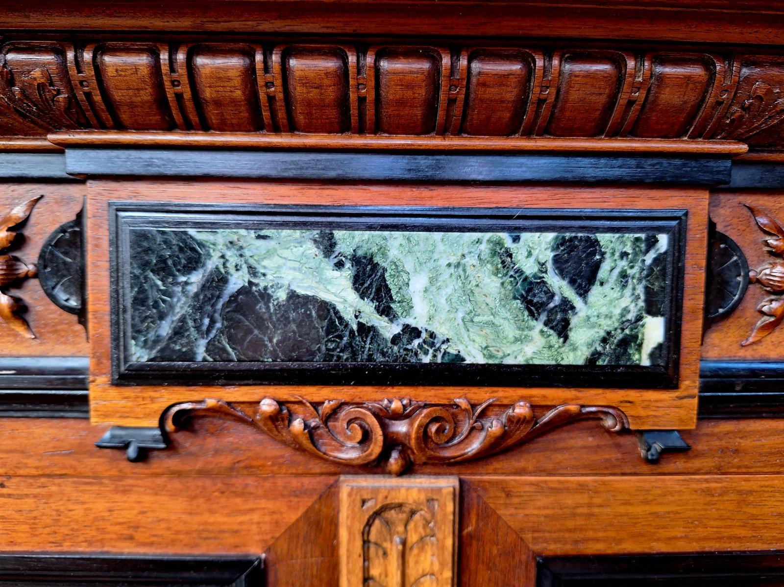 Renaissance style walnut cabinet.