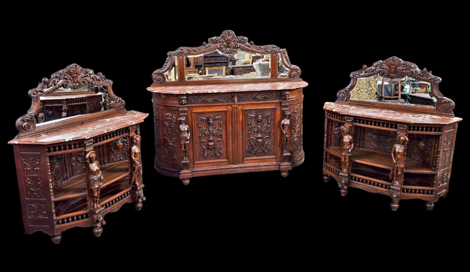 Richly carved Renaissance styled dining suite.