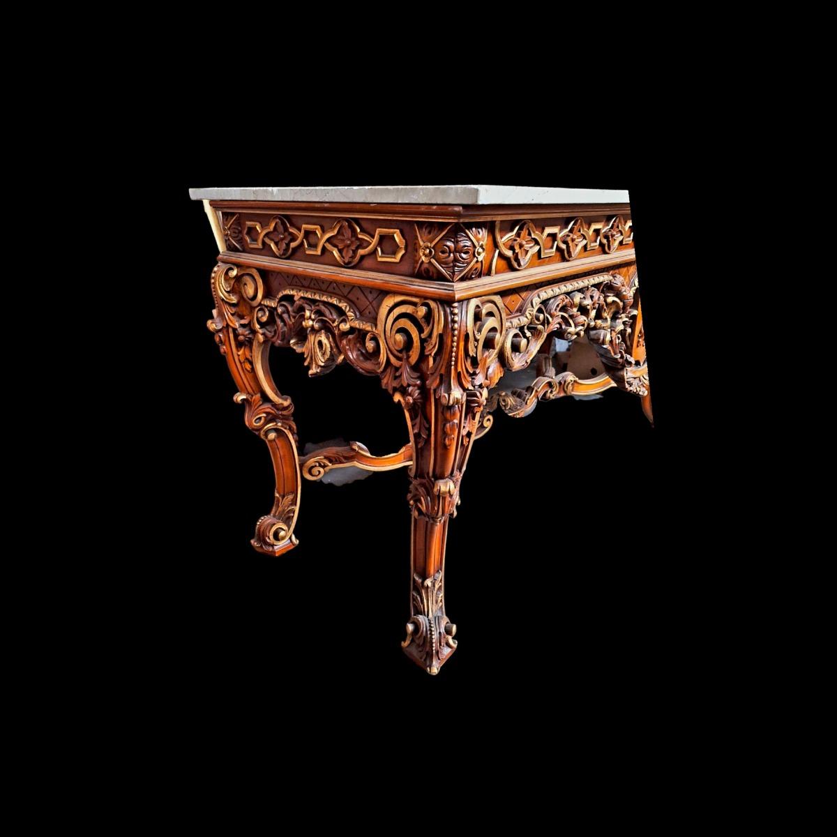 Very rich carved and coloured console table with a white marble top.  Ideal to decorate your entrance hall and impress imediately your visitors...